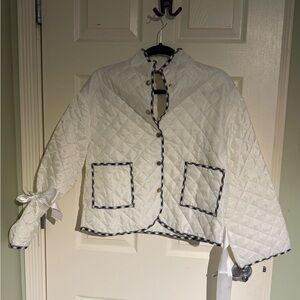 White Quilted Jacket with Black Trim